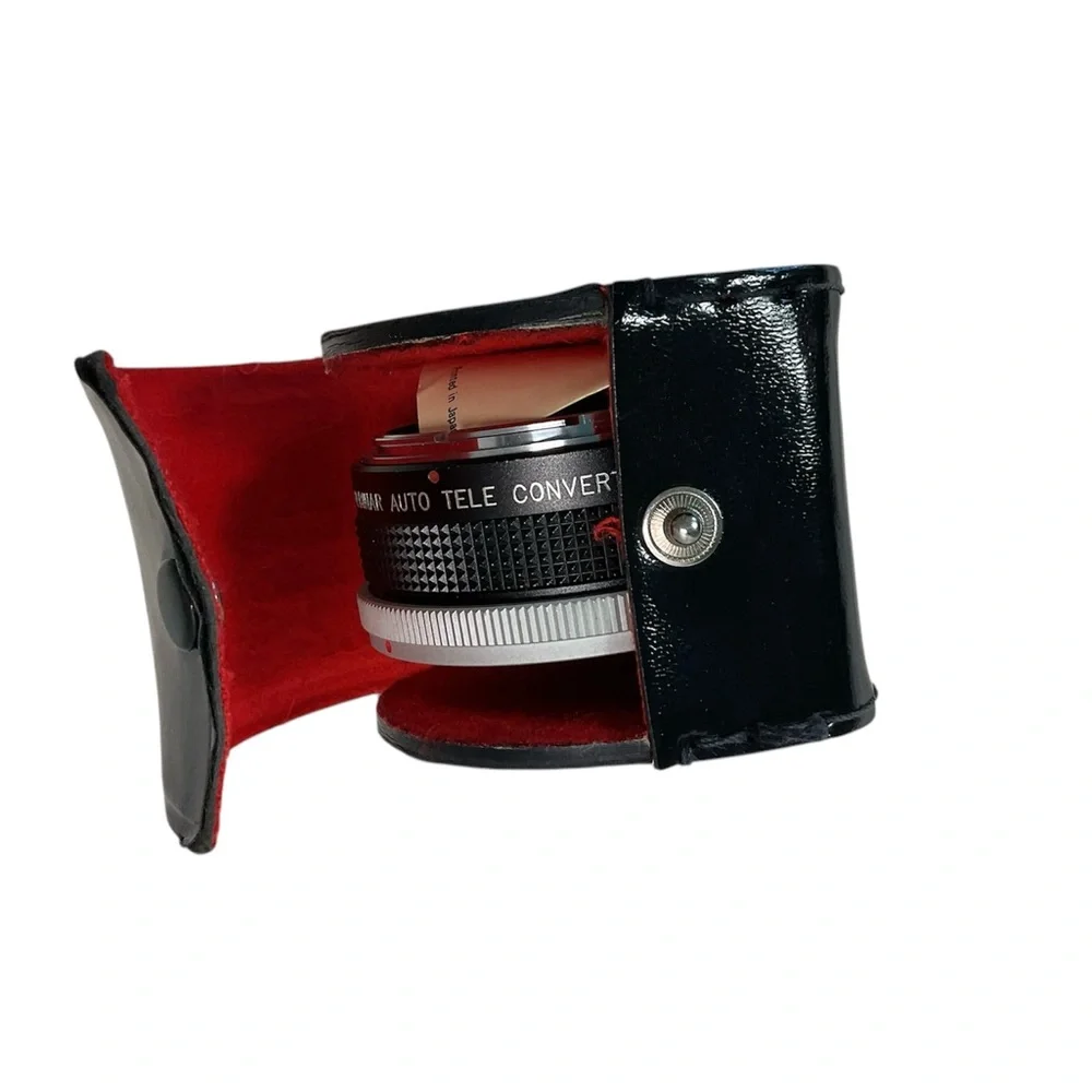 Canon T70 auto wind film camera with zoom lens , 2X converter and flash